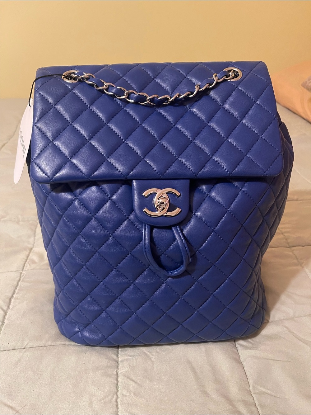 CHANEL Blue Quilted Lambskin Backpack with Chain-Trim